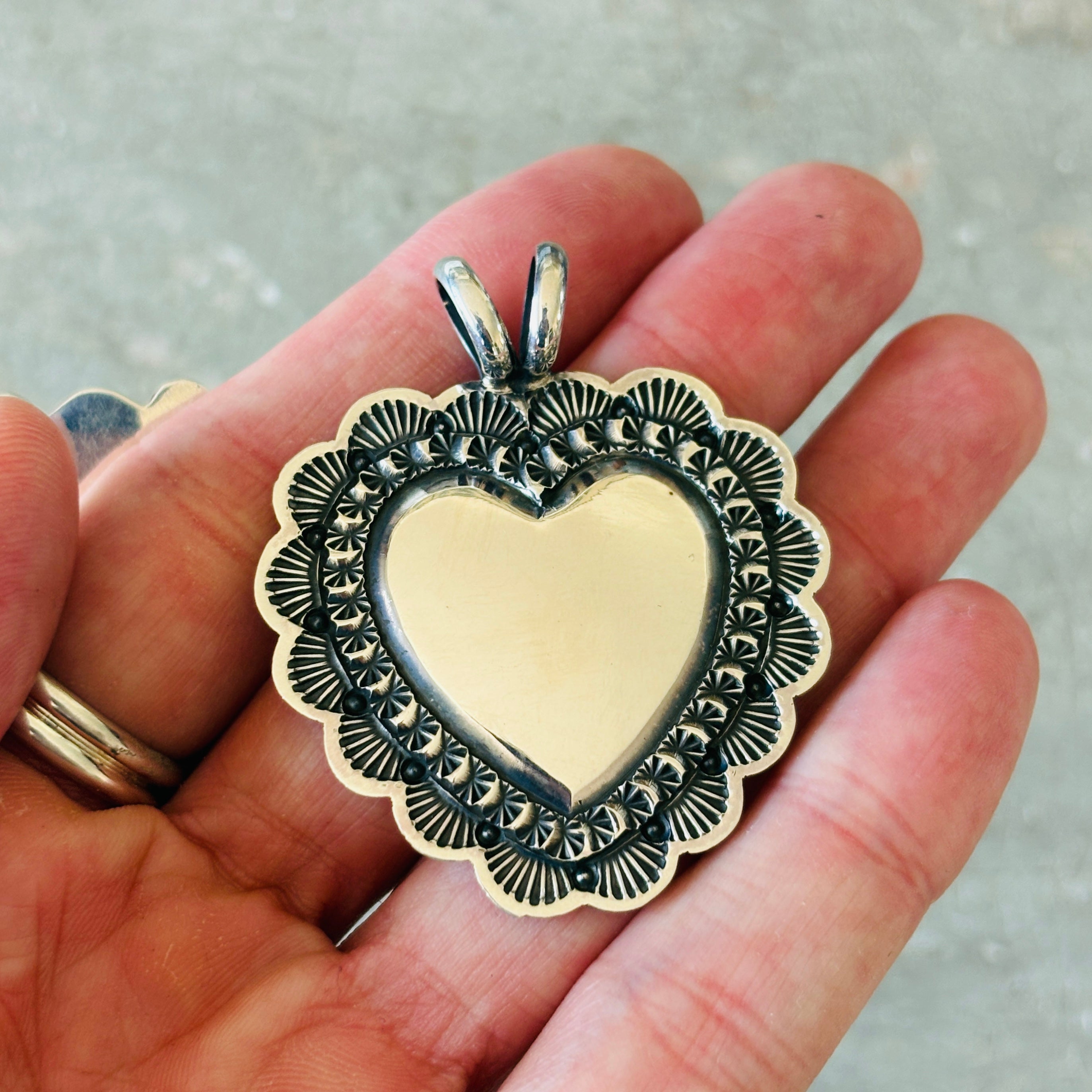 Navajo Sunshine Reeves Sterling Silver Heart Pendant – Sunshine