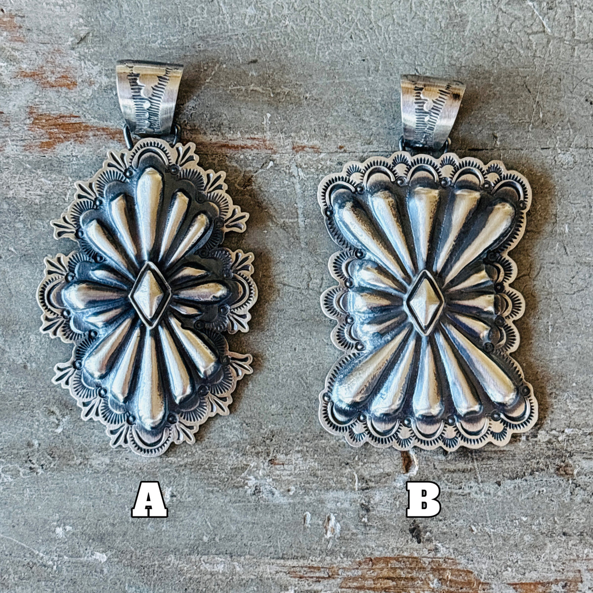 Navajo Arnold Goodluck Sterling Silver Concho Pendant