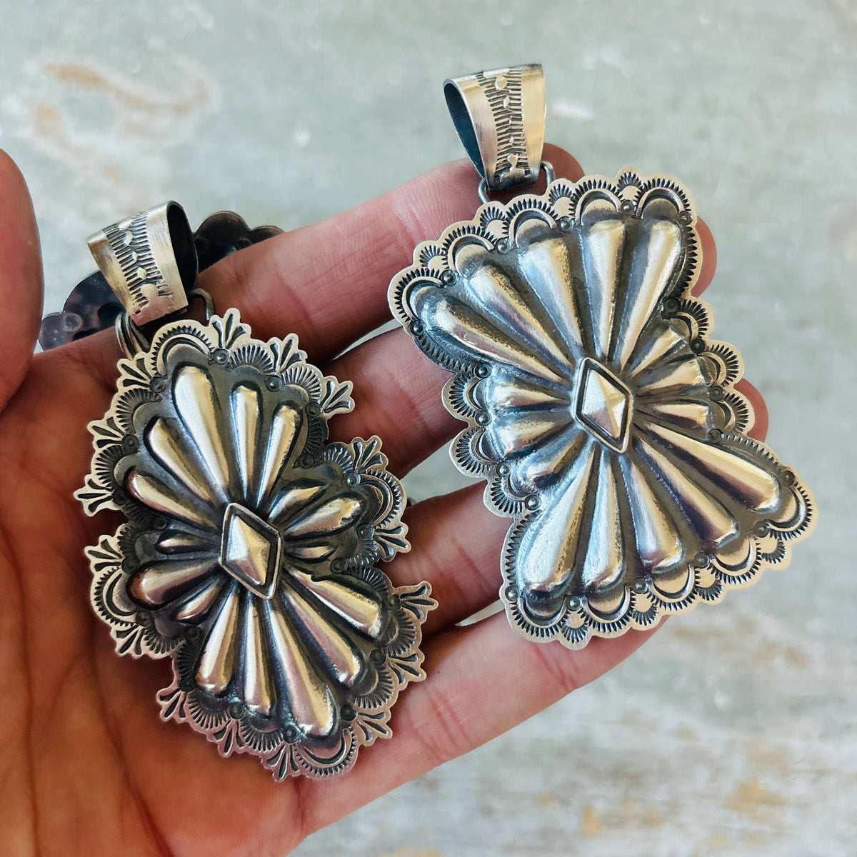 Navajo Arnold Goodluck Sterling Silver Concho Pendant
