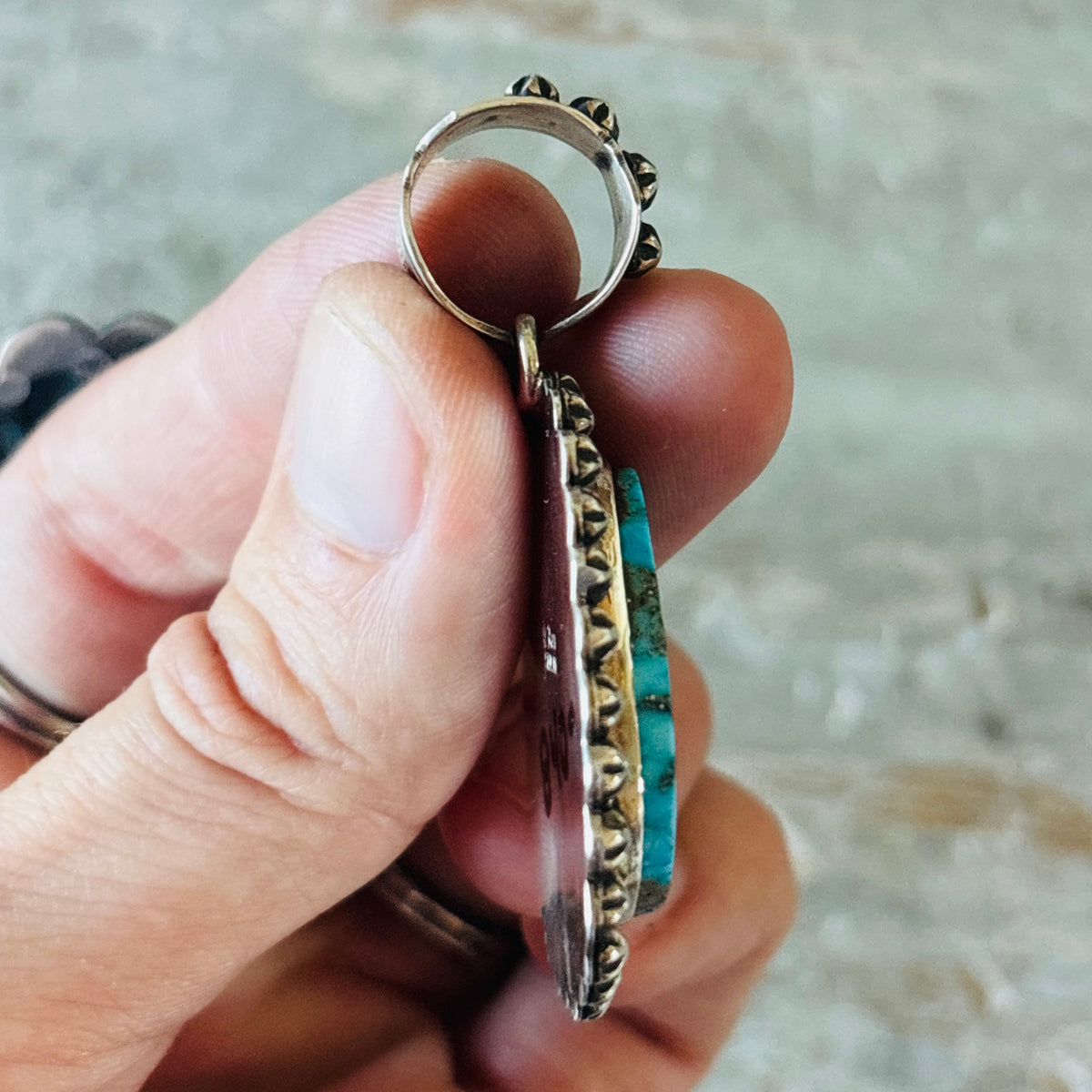 Navajo Happy Piasso Sterling Silver & High Grade Kingman Turquoise Starburst Pendant